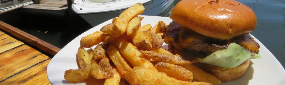 Where is the best burger? Follow this couple along their boating journey to track down the Perfect Cheeseburger.